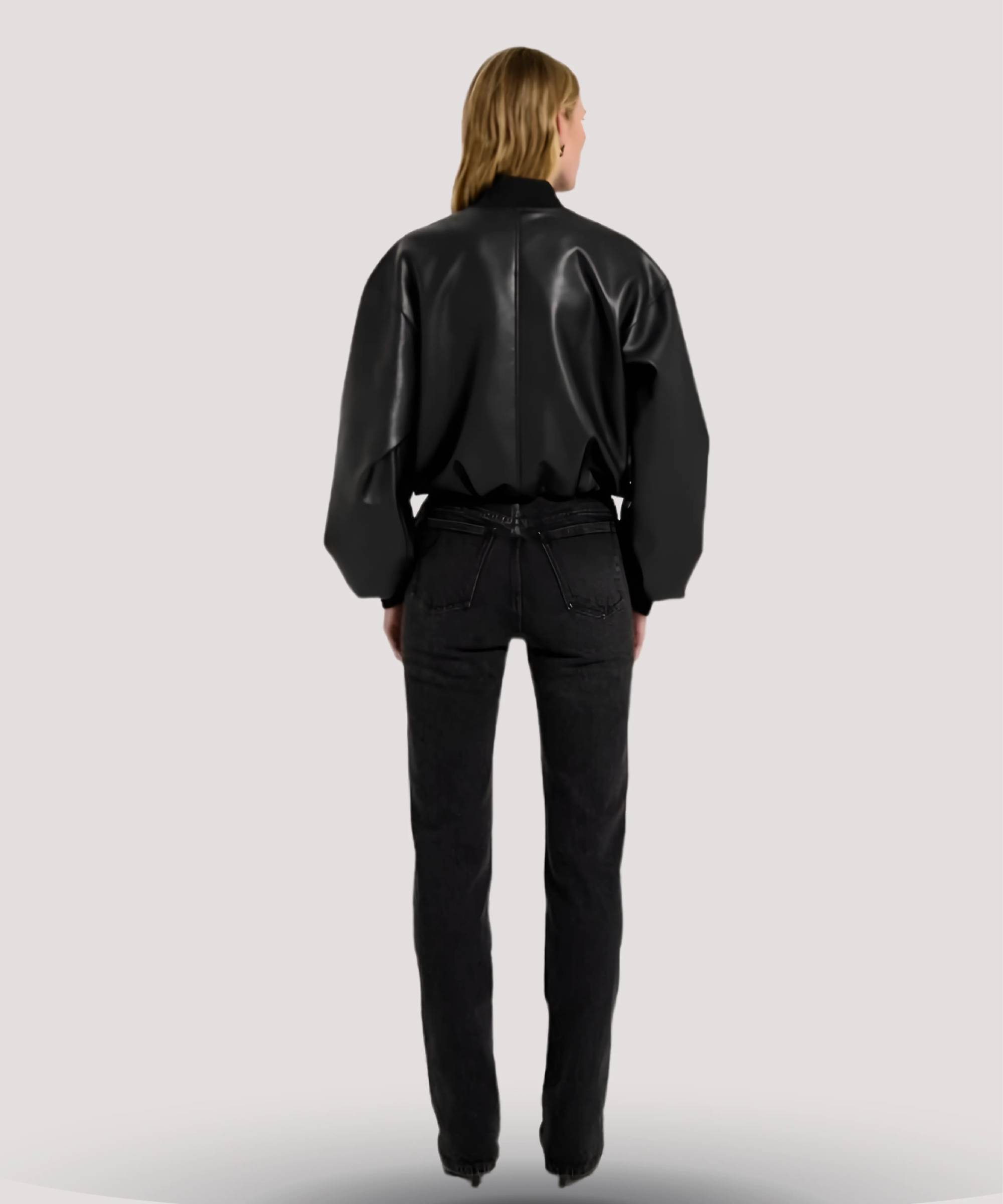 Back-view-Womens-black-bomber-leather-jacket-inspired-by-Sandra-Bullock-with-a-modern-cut-durable-leather-material-and-versatile-styling-for-casual-or-dressy-occasions
