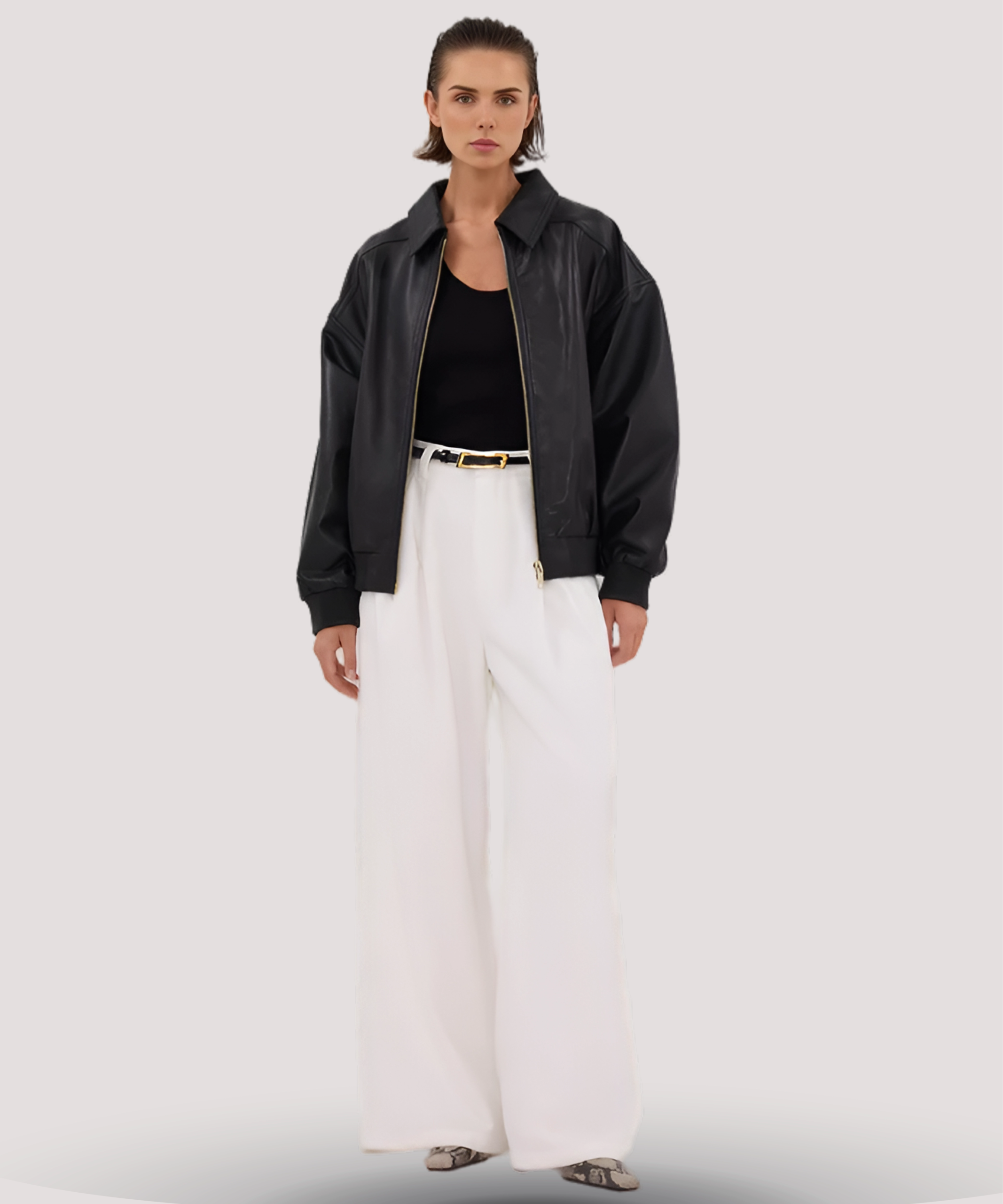 Front-view-of-black-oversized-leather-bomber-jacket-vintage-streetwear-outerwear-relaxed-fit-collared-neckline-shop-online