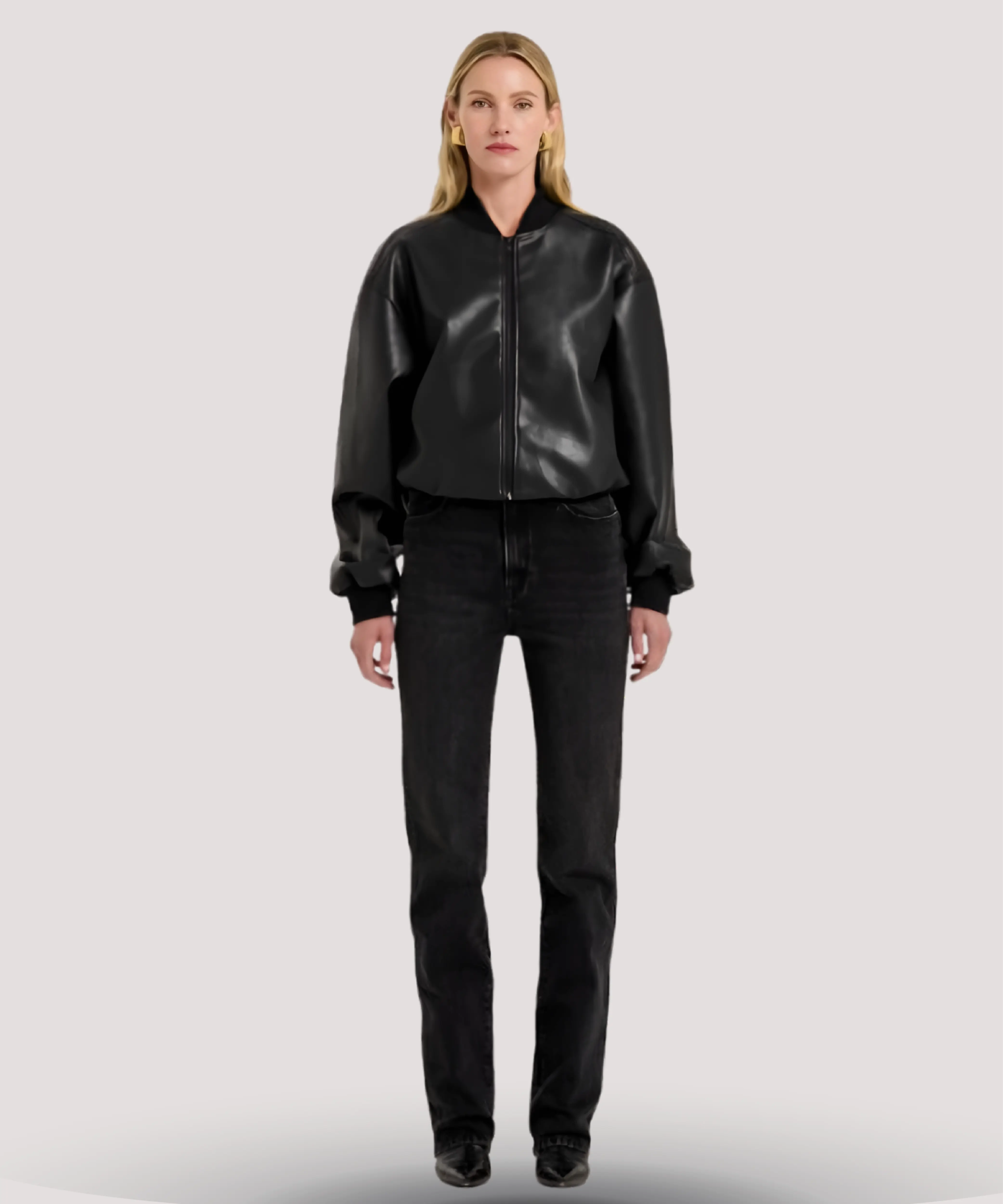Sandra-Bullock-inspired-black-leather-bomber-jacket-with-comfortable-lining-zip-front-and-ribbed-cuffs-perfect-for-womens-chic-and-durable-outerwear-