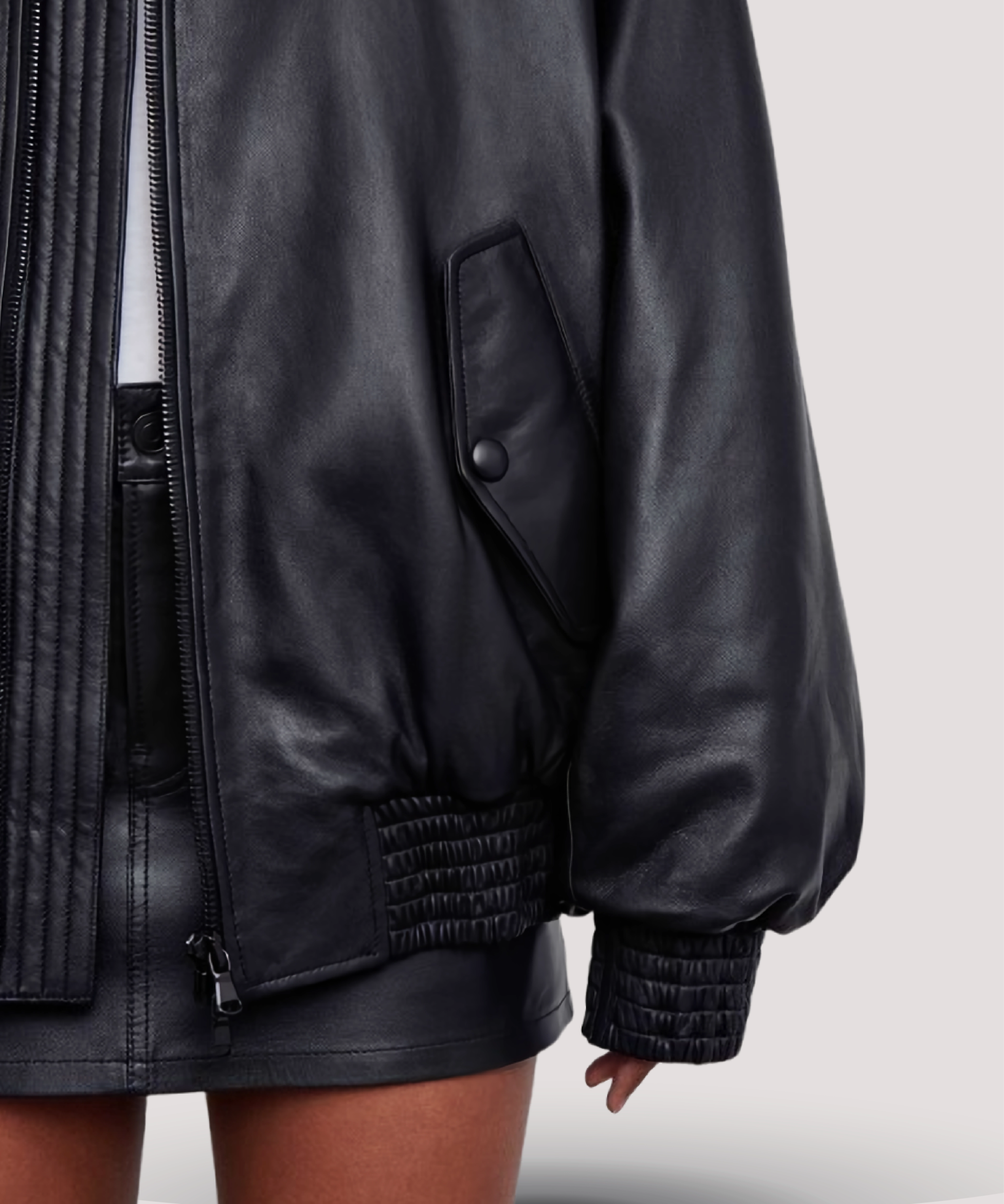 Selena-Gomez-style-womens-black-leather-bomber-jacket-styled-with-jeans-and-boots-effortless-outfit-idea-for-fall-and-transitional-weather-