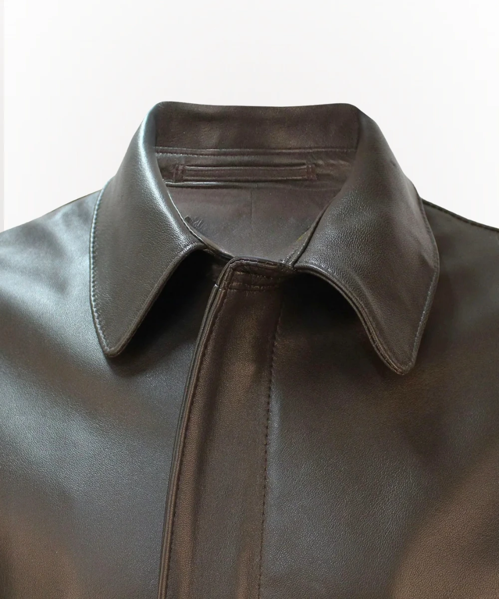 Man wearing Indiana Jones style brown leather jacket with adventure outfit and fedora hat ensemble