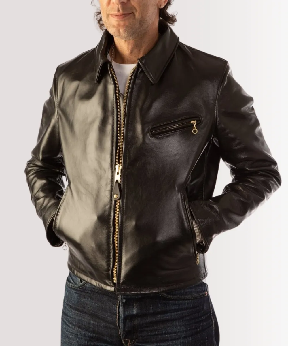 Classic 1980s leather jacket in black with motorcycle-inspired design and metal zippers