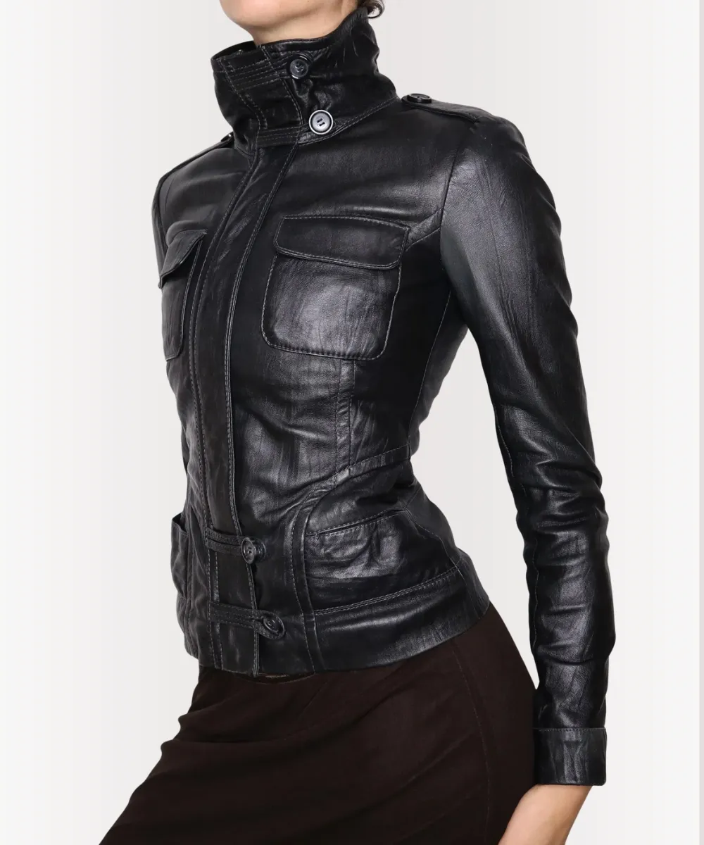 Vintage Y2K women’s black leather biker jacket with silver hardware.