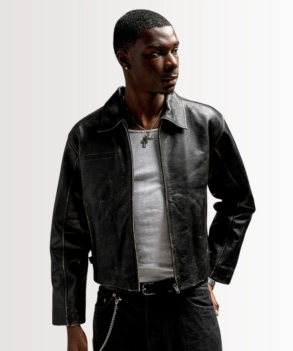 Close-up of black suede leather jacket texture highlighting soft, premium material