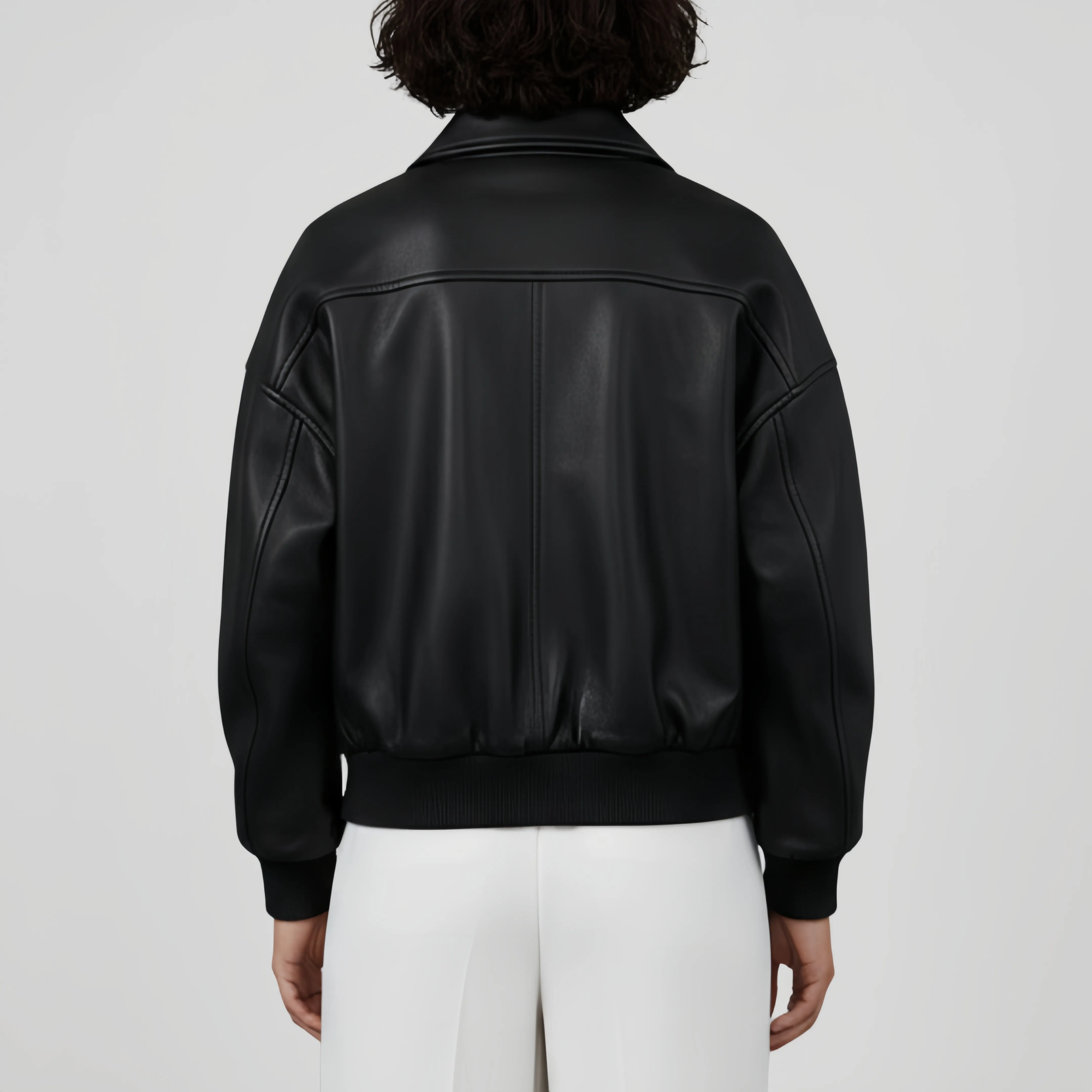 Back-view-of-oversized-black-leather-bomber-jacket-heavy-grade-leather-casual-street-style-look-available-to-buy-online