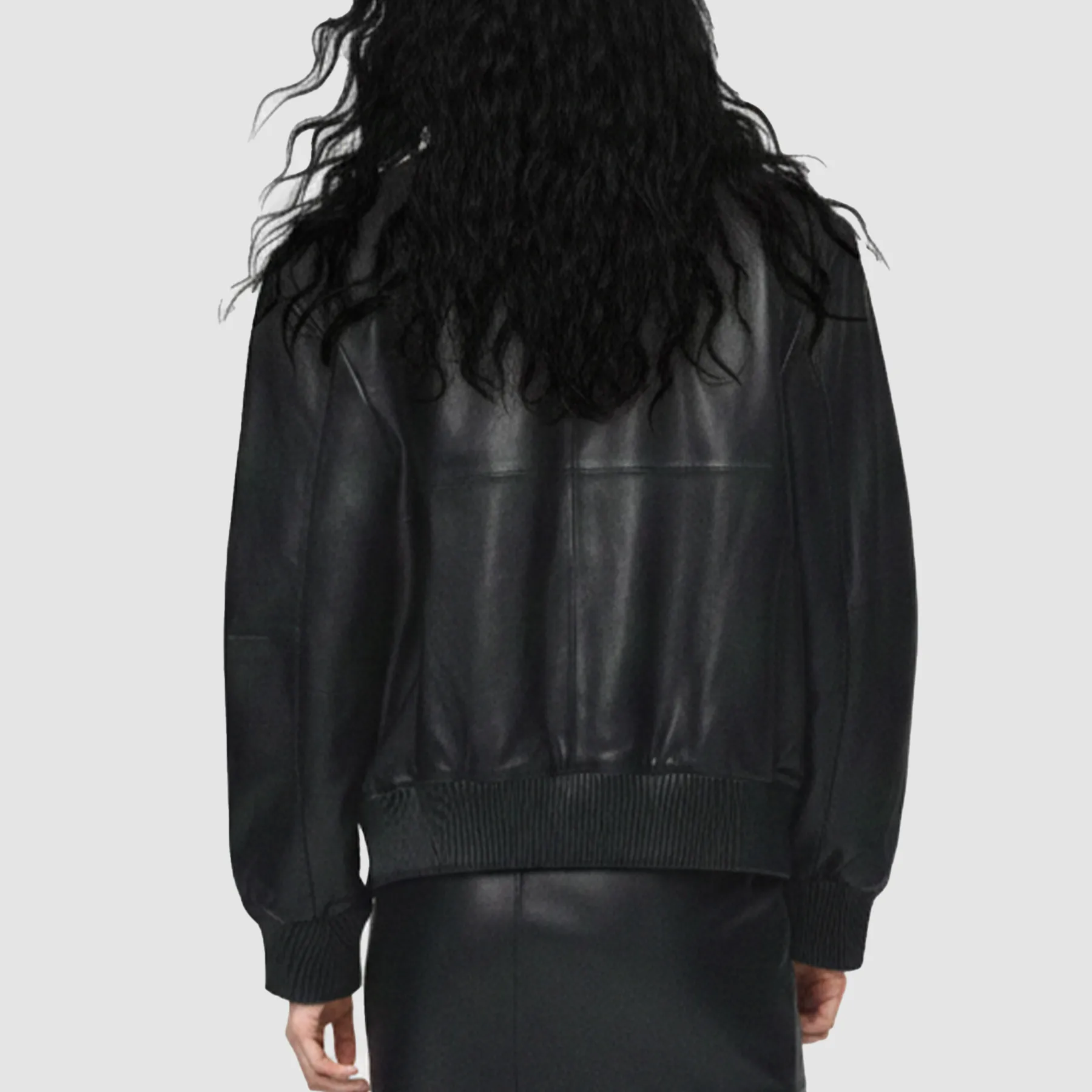 Back-view-of-oversized-leather-biker-jacket-in-dark-brown-showcasing-premium-lamb-leather-and-roomy-pockets-for-functional-fashion.