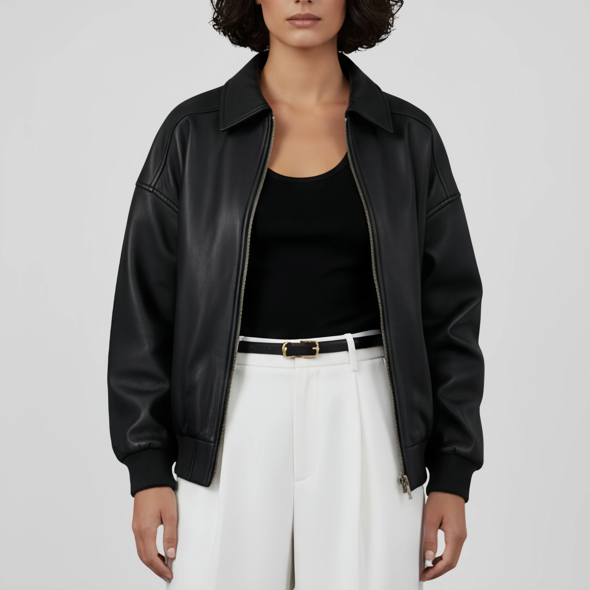 Close-up-of-bomber-black-leather-jacket-zipper-and-brushed-gold-hardware-premium-leather-texture-buy-this-jacket-online-