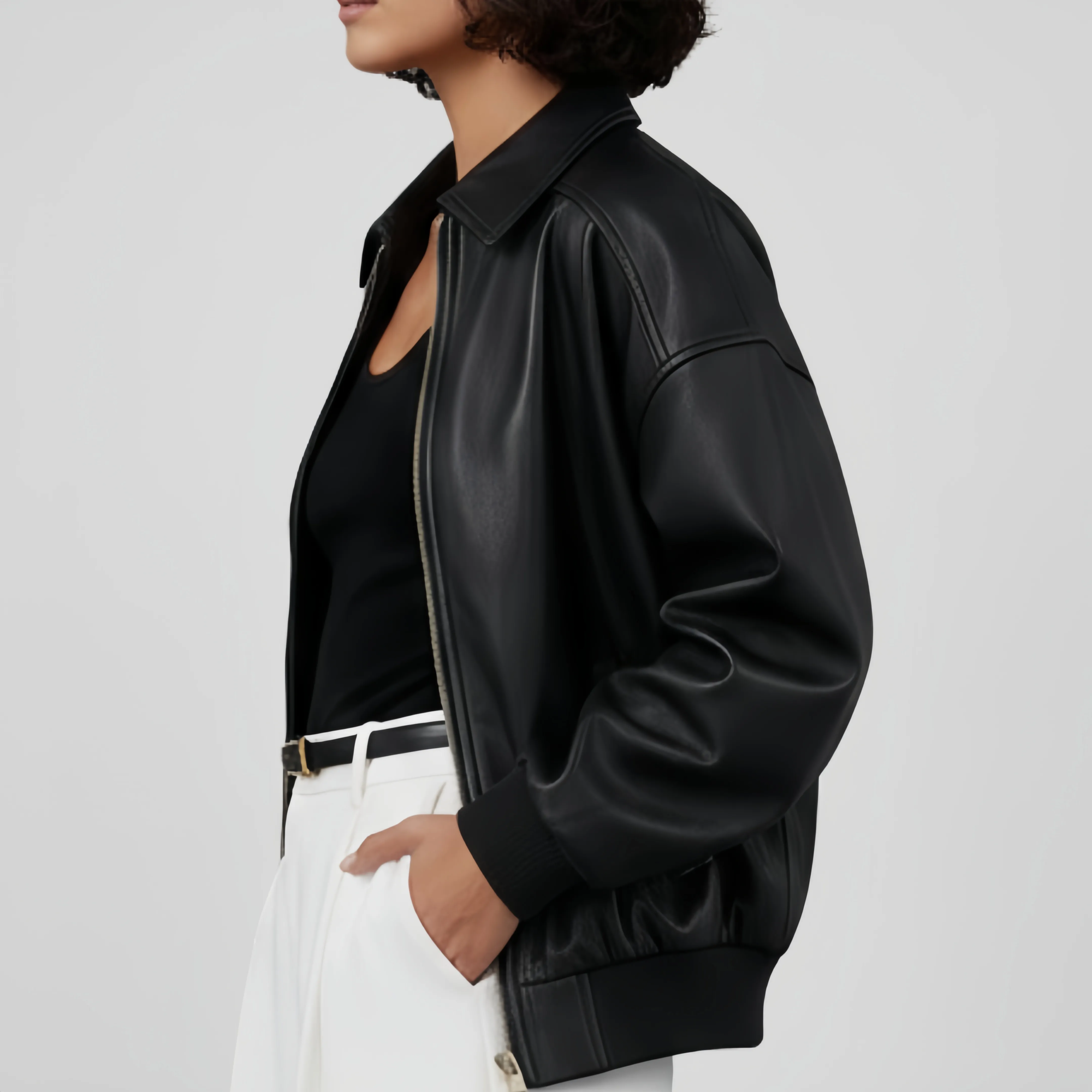 Oversized-bomber-leather-jacket-laid-flat-real-black-leather-bomber-jacket-with-elastic-cuffs-and-hem-heavy-duty-outerwear-shop-online