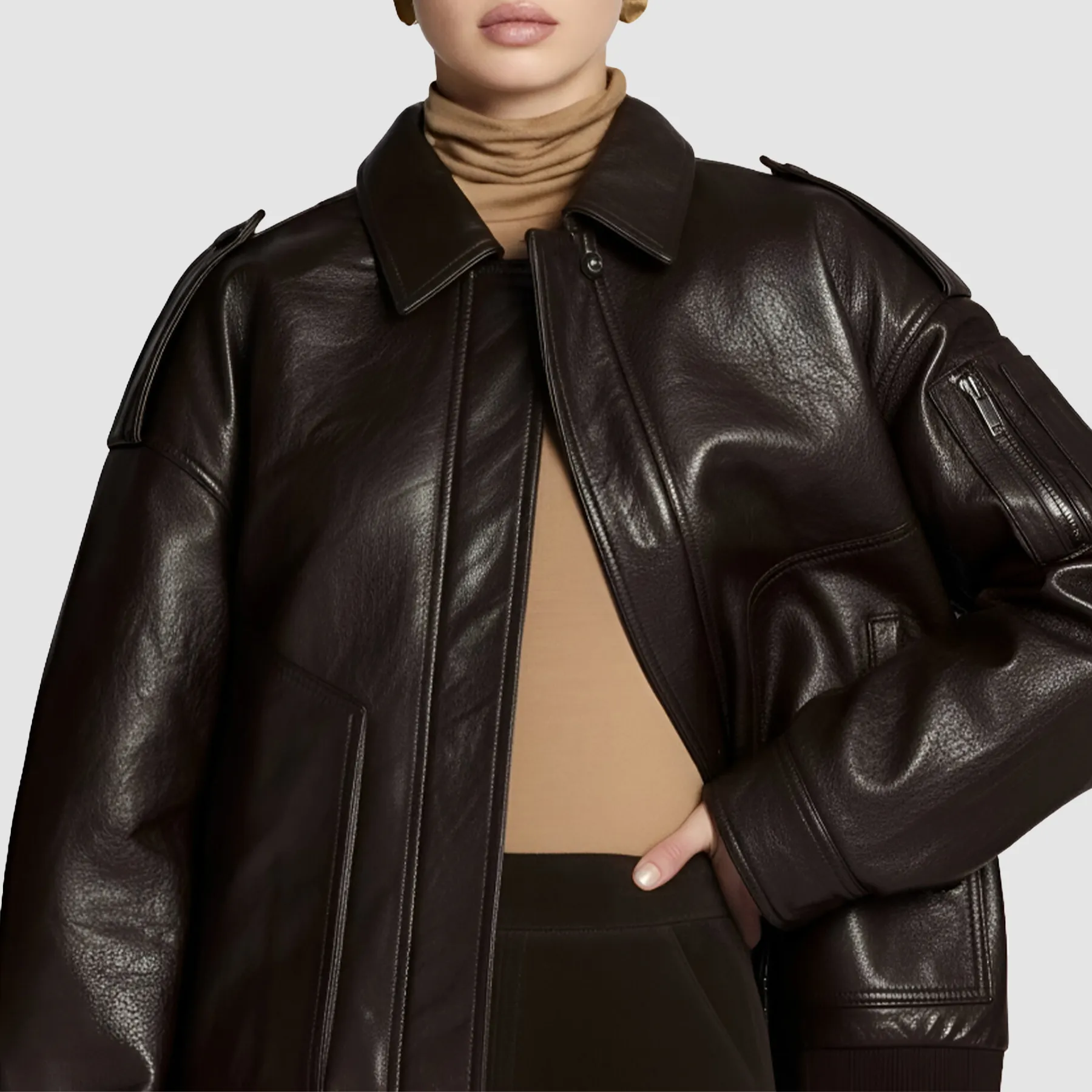 Woman-wearing-brown-vintage-leather-bomber-jacket-front-view