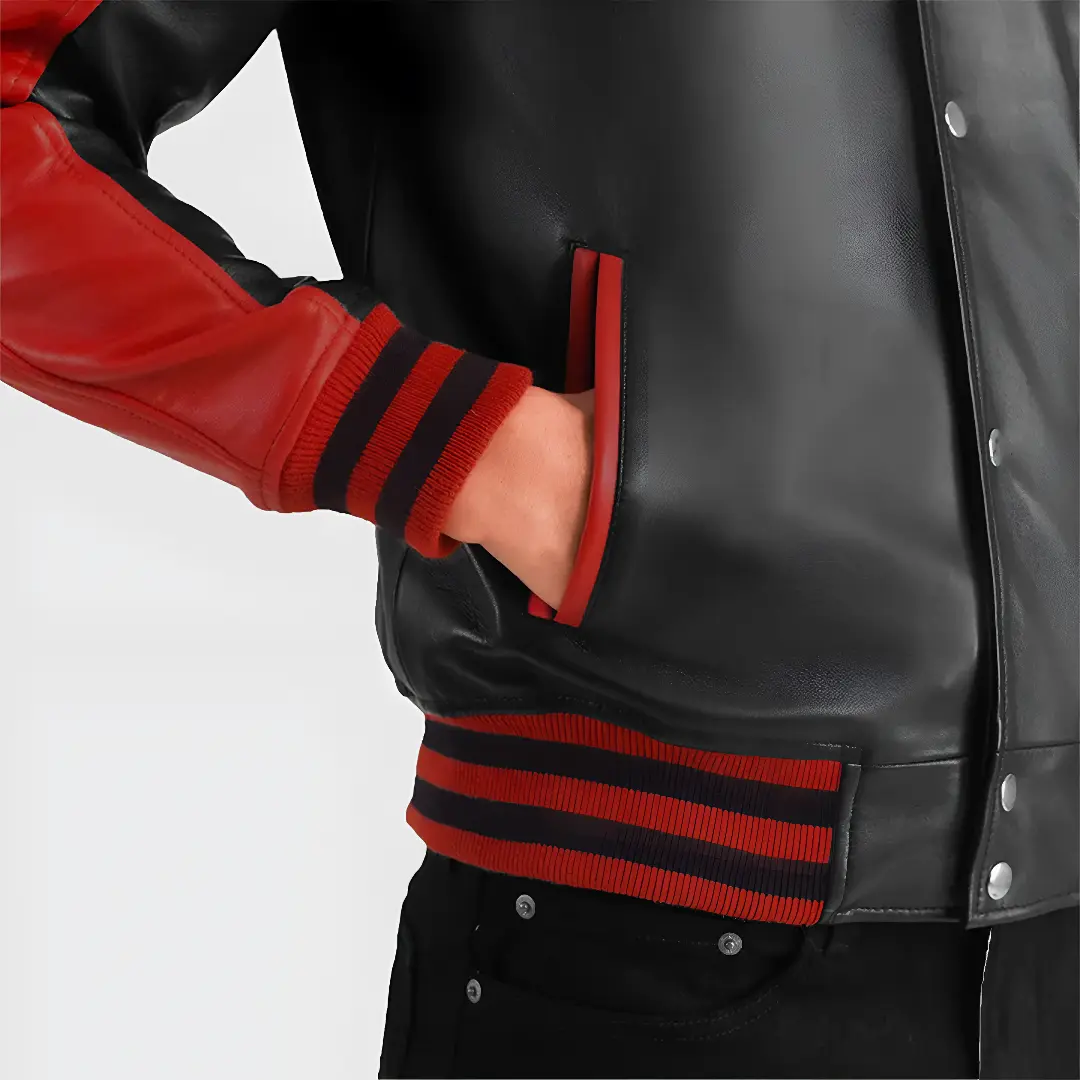 Side profile of red and black varsity leather jacket highlighting raglan sleeves and comfortable fit