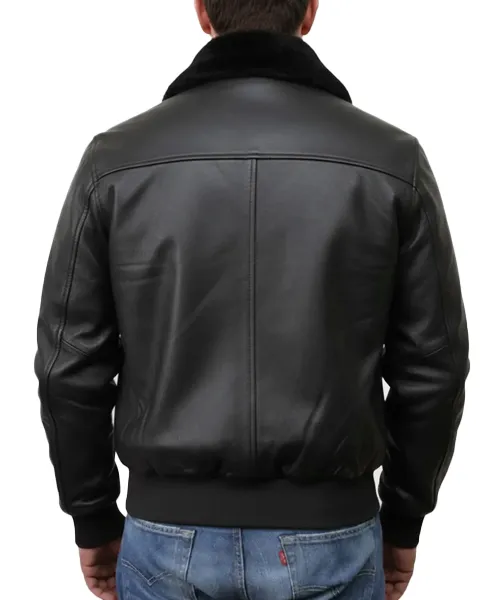 Back view of men’s black leather jacket with fur collar highlighting smooth leather finish and bomber cut