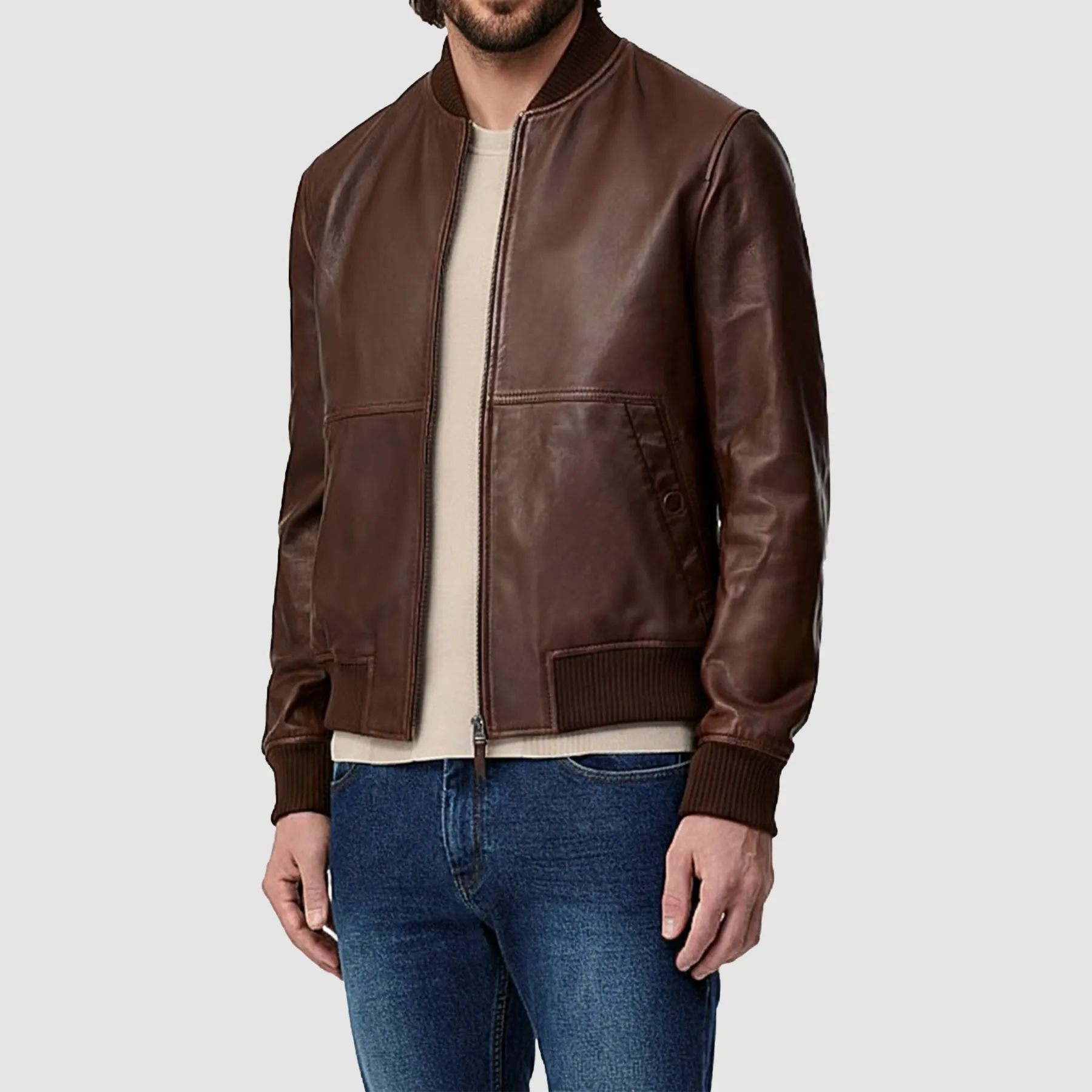 Front-view-of-mens-brown-leather-bomber-jacket-with-zip-closure-and-ribbed-cuffs-on-white-background
