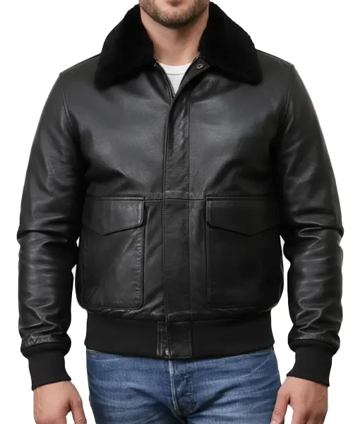 Men wearing a black leather jacket with fur collar standing confidently against a neutral background