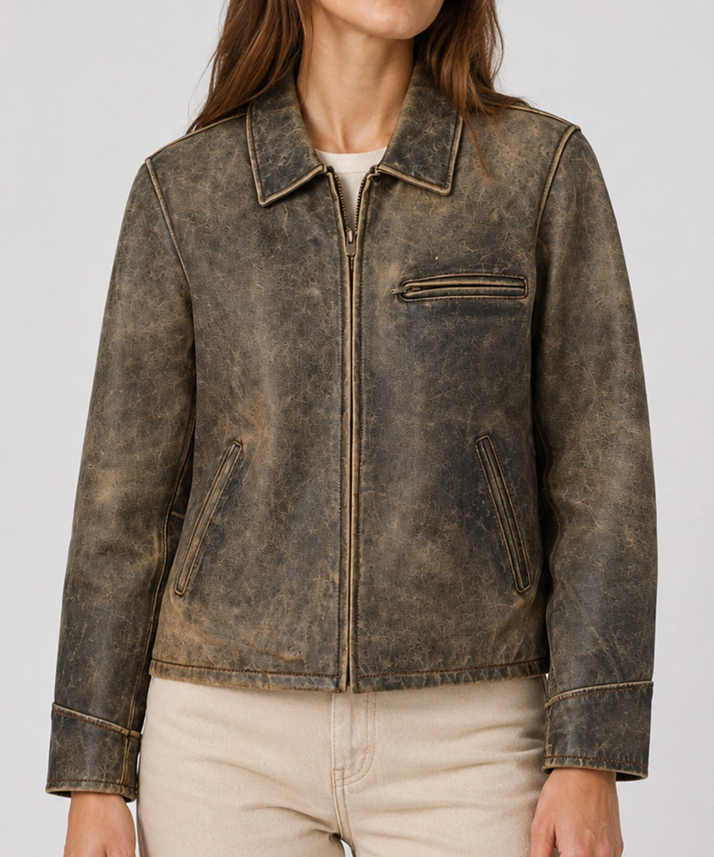 Women wearing a vintage distressed leather jacket with classic zipper closure