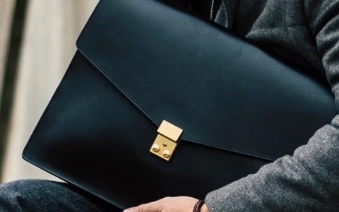 black leather laptop sleeve